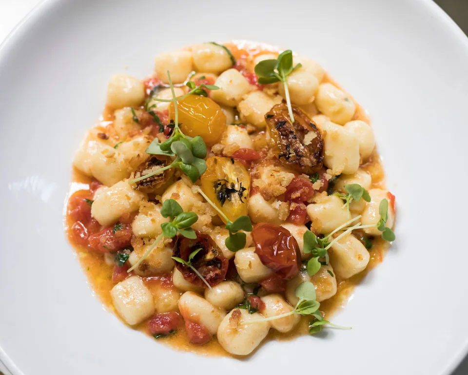 Gnocchi with cherry tomatoes and herbs